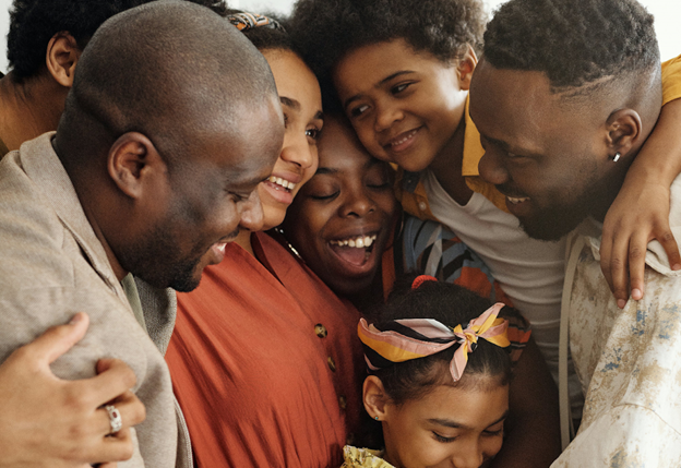 a group of people that are looking at a cell phone